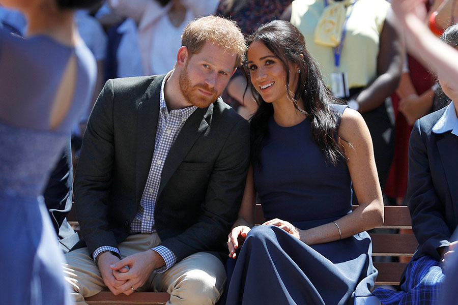 Meghan y Harry en playa de Síndey