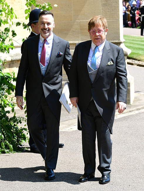 Sir Elton John y David Furnish en la boda de Harry y Meghan
