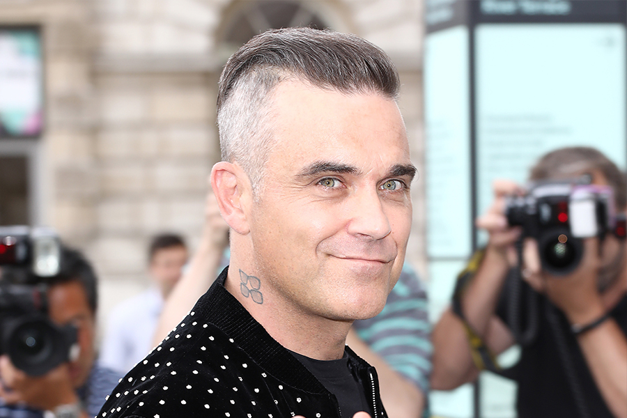 Robbie Williams' Secret to Surviving Confinement Without Divorcing