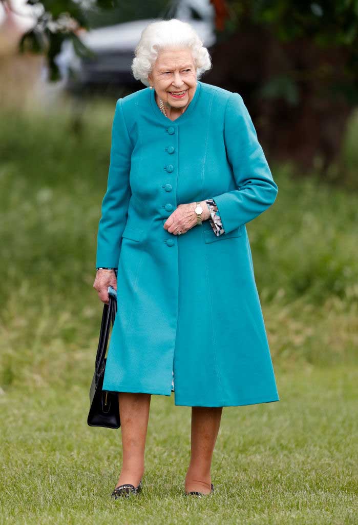 reina isabel en range rover